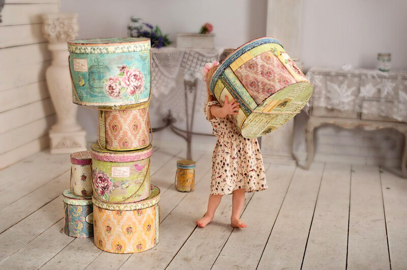 Child Holding a Box