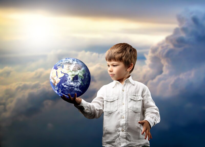 child holding a globe