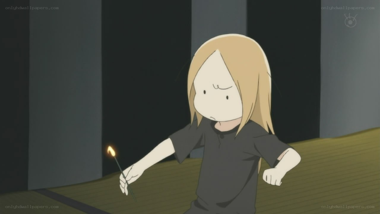 child holding a lit match