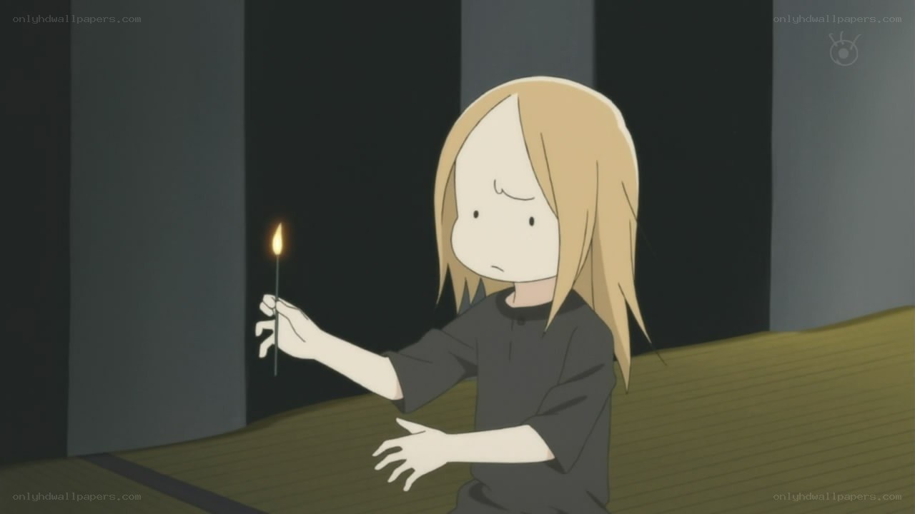 child holding a lit match