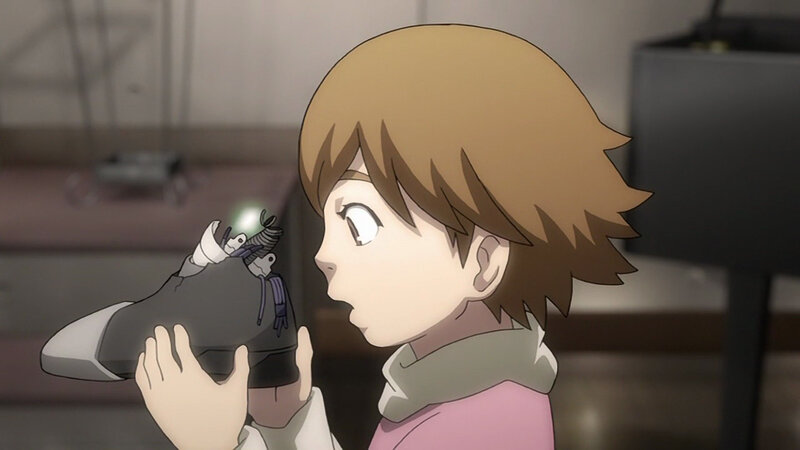 child holding a robot