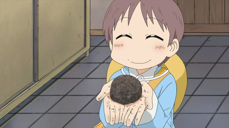 child holding a rock