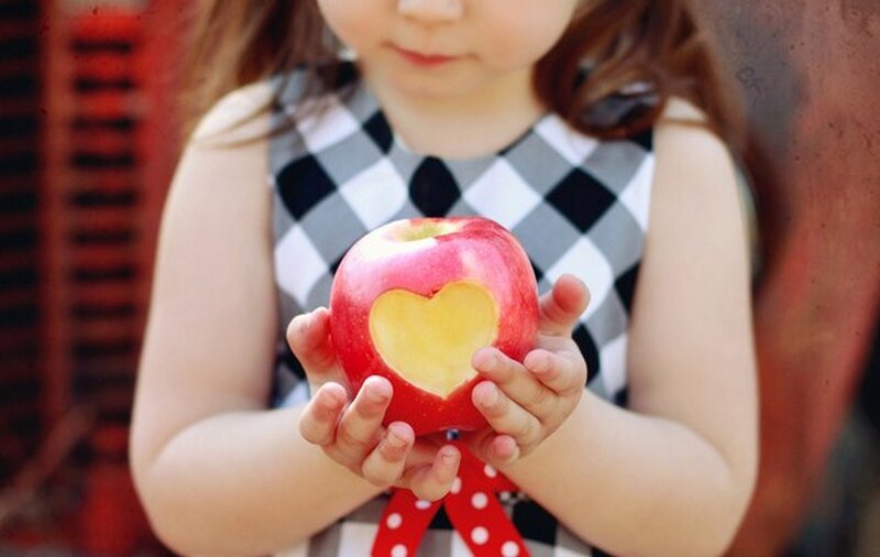 Child Holding Apple — Red, Calm