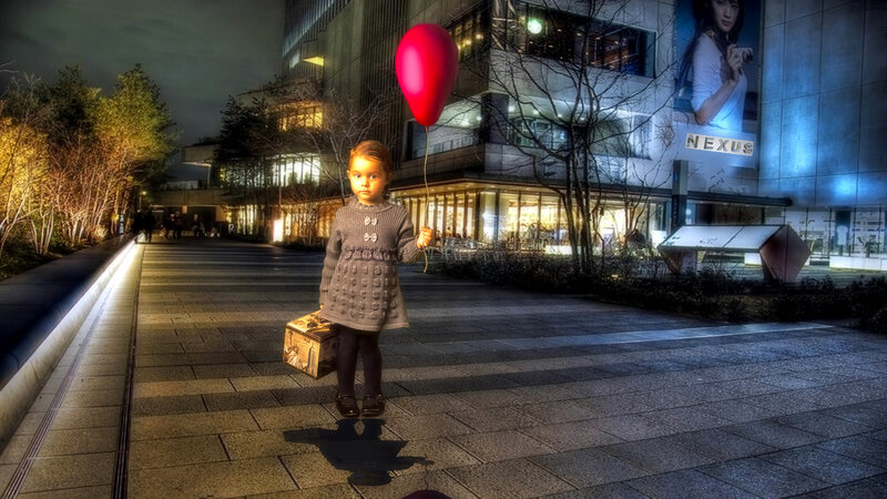 Child Holding Balloon — Gray