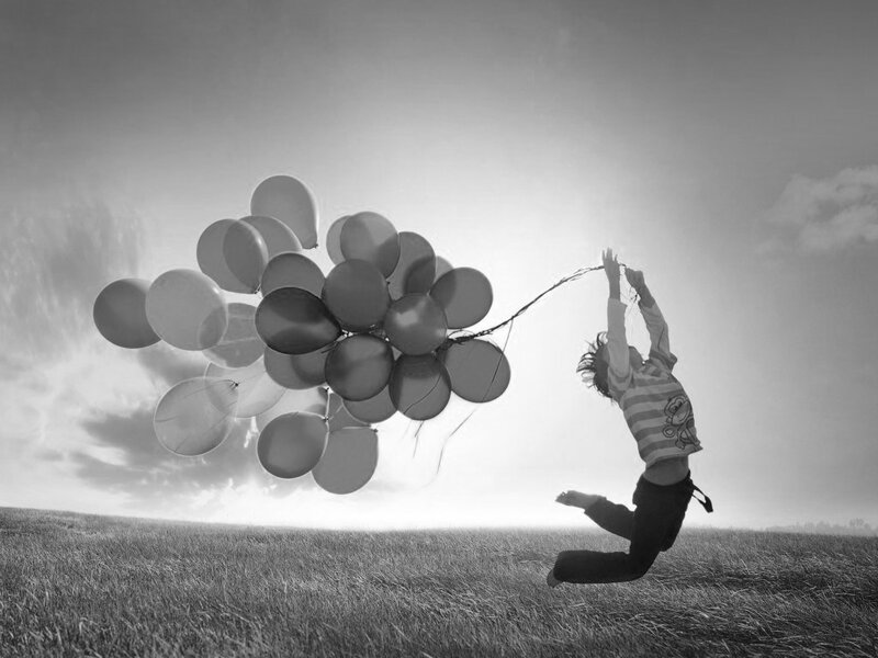 Child Holding Balloons — Black, Dreamy