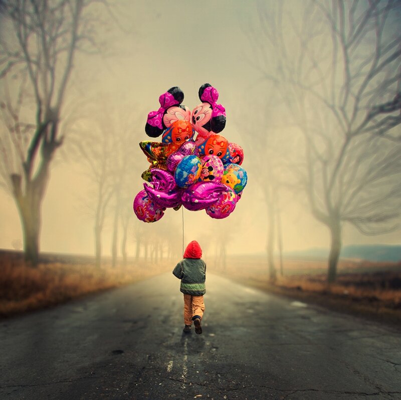 Child Holding Balloons — Gray