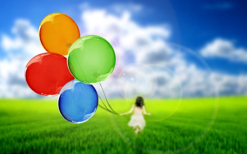 Child Holding Balloons — Green, Playful