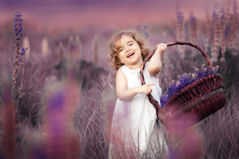 Child Holding Basket — Purple