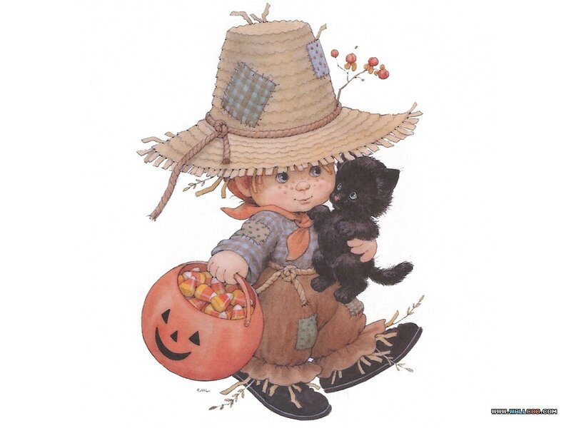 Child Holding Black Kitten