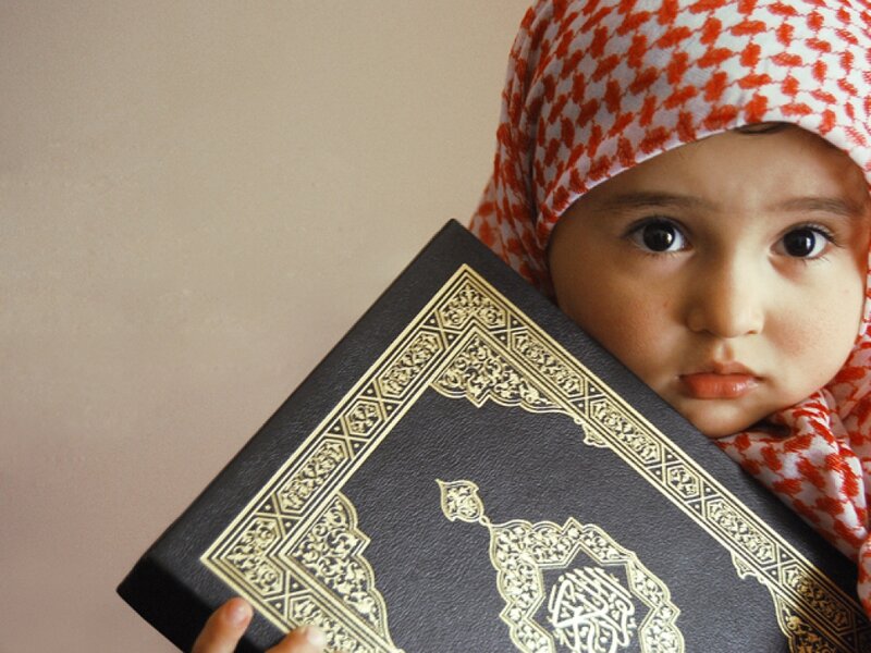 Child Holding Book