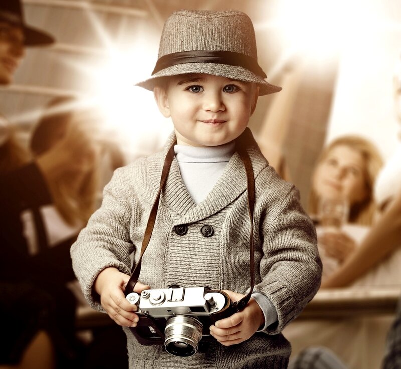Child Holding Camera — Brown, Warm