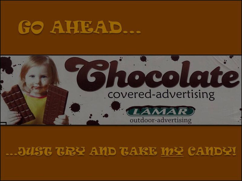 Child Holding Chocolate Bars