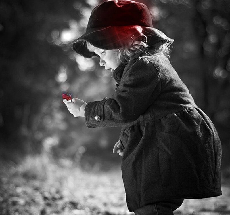 Child Holding Flower — Black