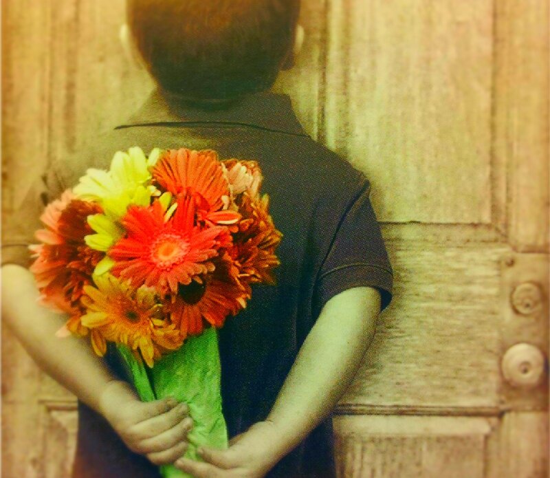 Child Holding Flowers — Red