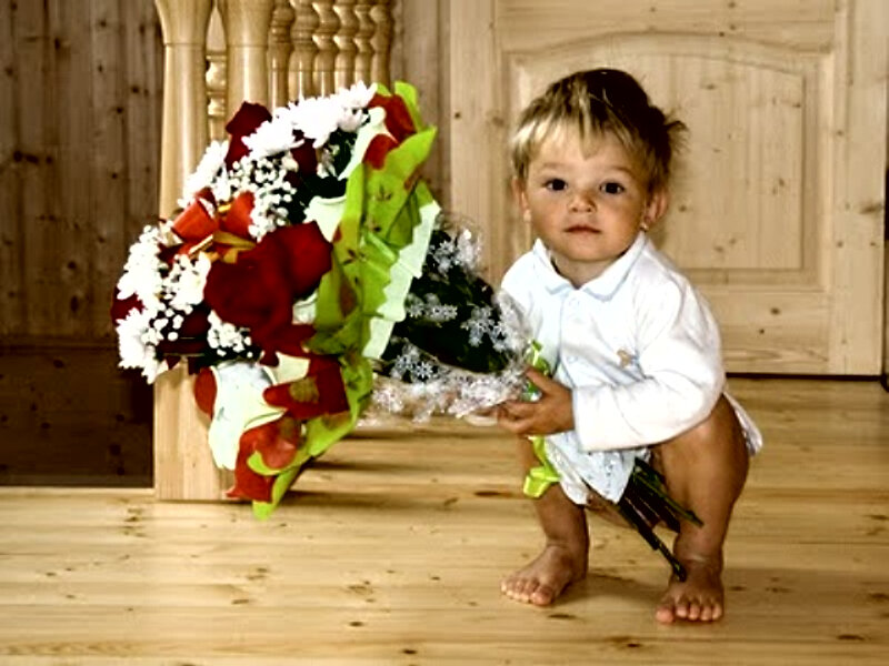 Child Holding Flowers — White