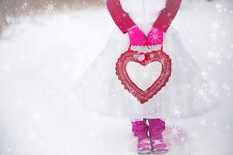 Child Holding Heart — White