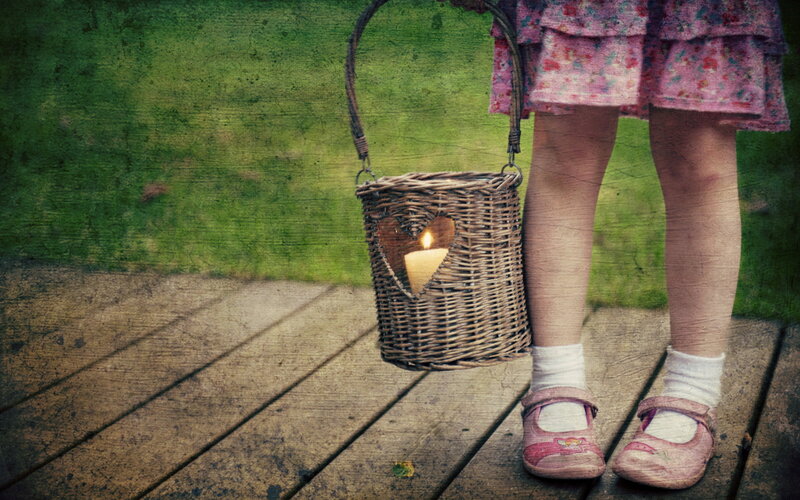 Child Holding Lantern