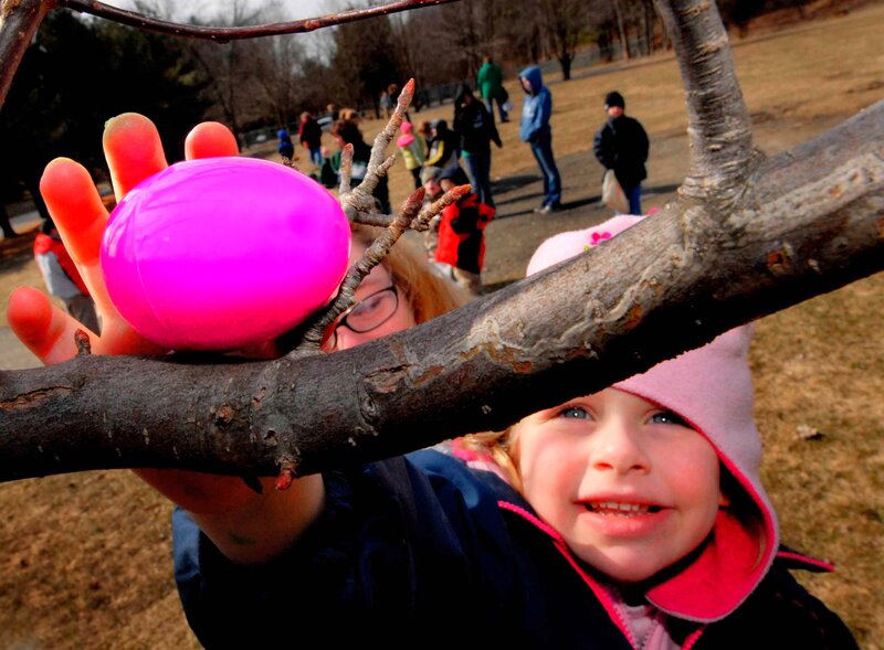 Child Holding Pink Egg