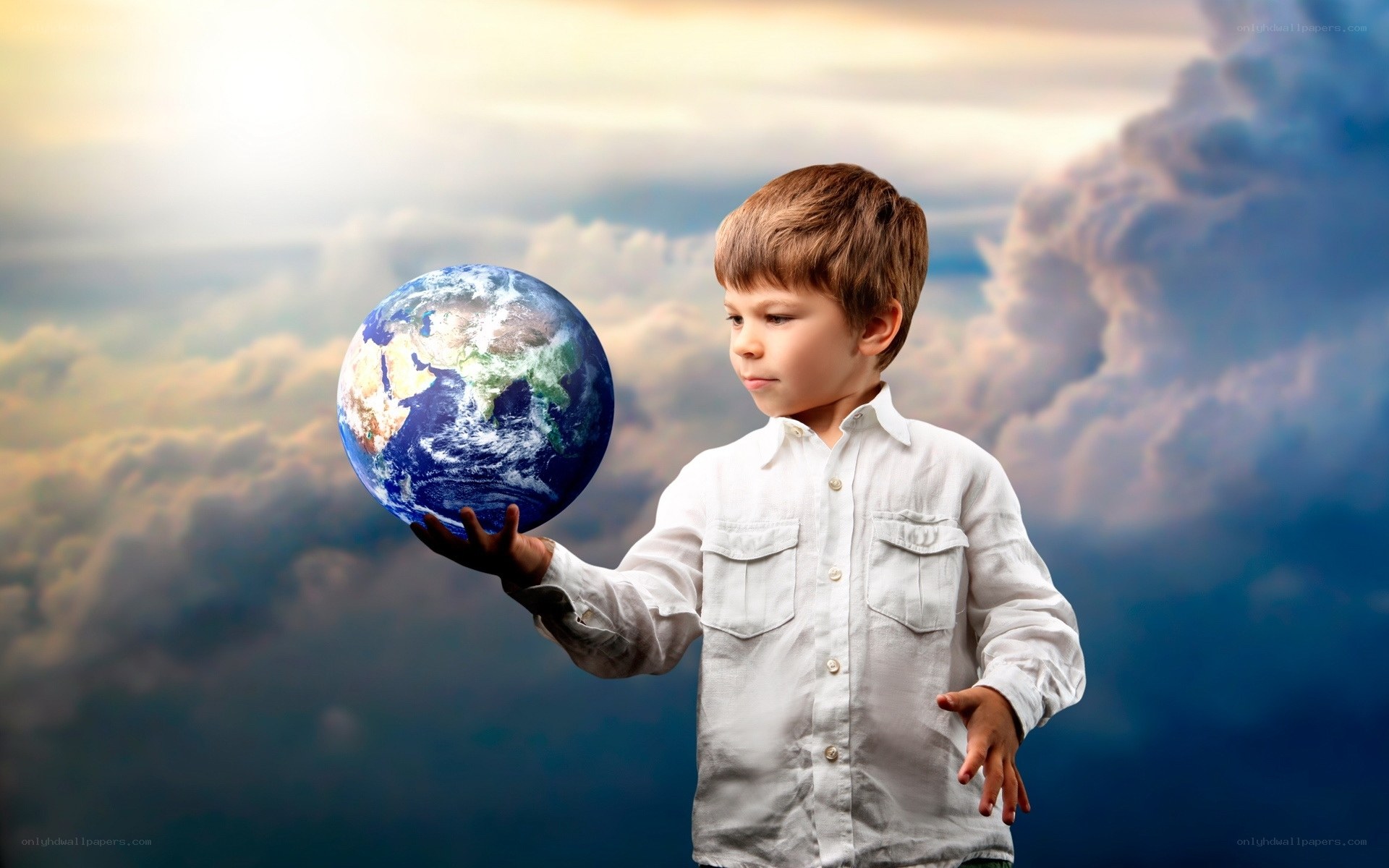 child holding planet earth