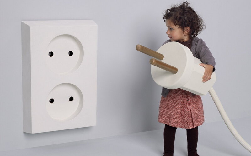 Child Holding Plug