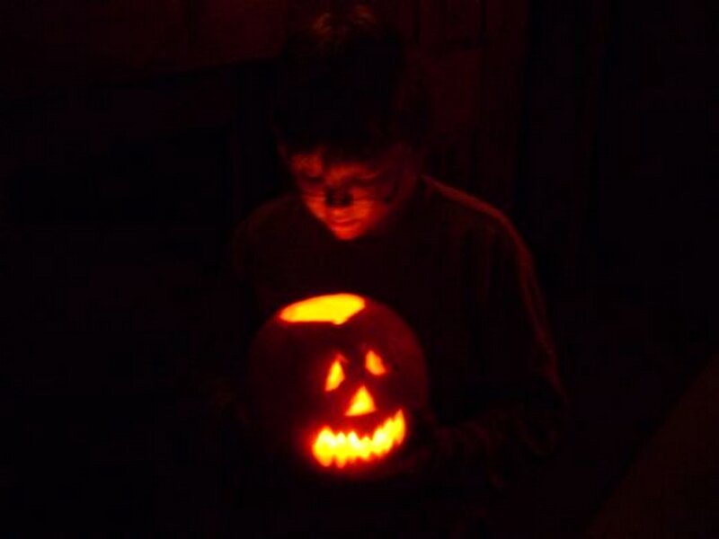 Child Holding Pumpkin