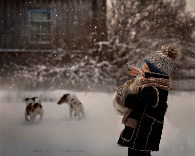 Child Holding Rabbit — White