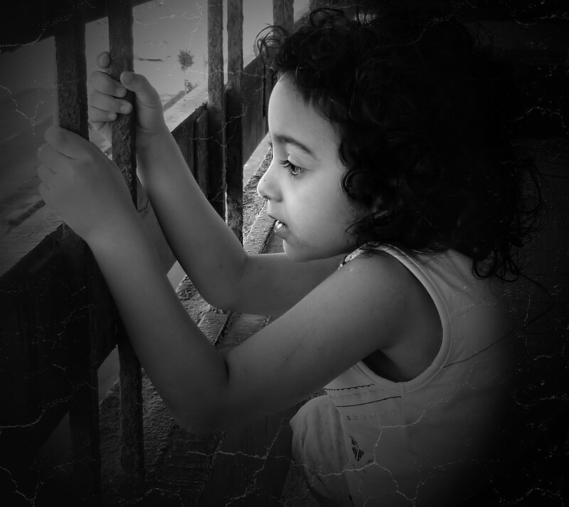 Child Holding Railing