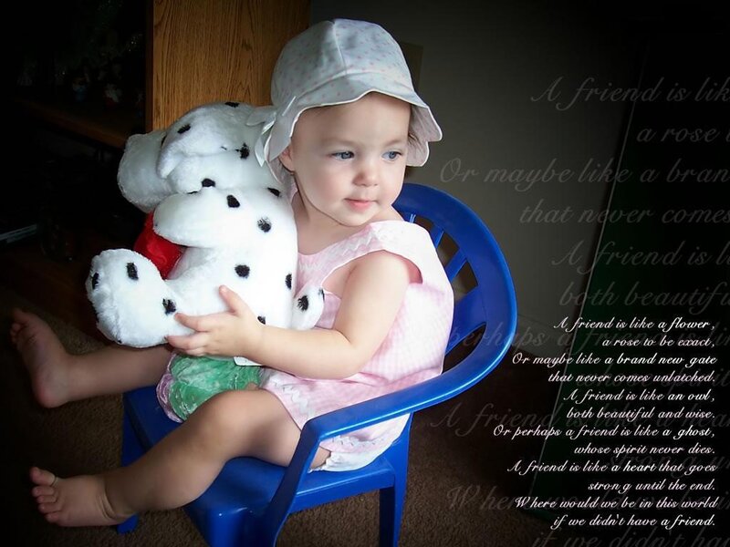 Child Holding Stuffed Dog