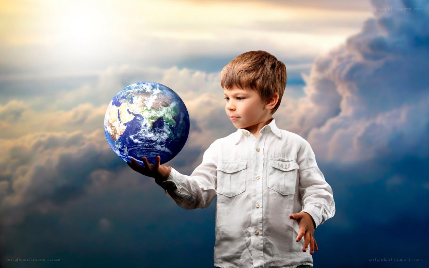 child holding the earth