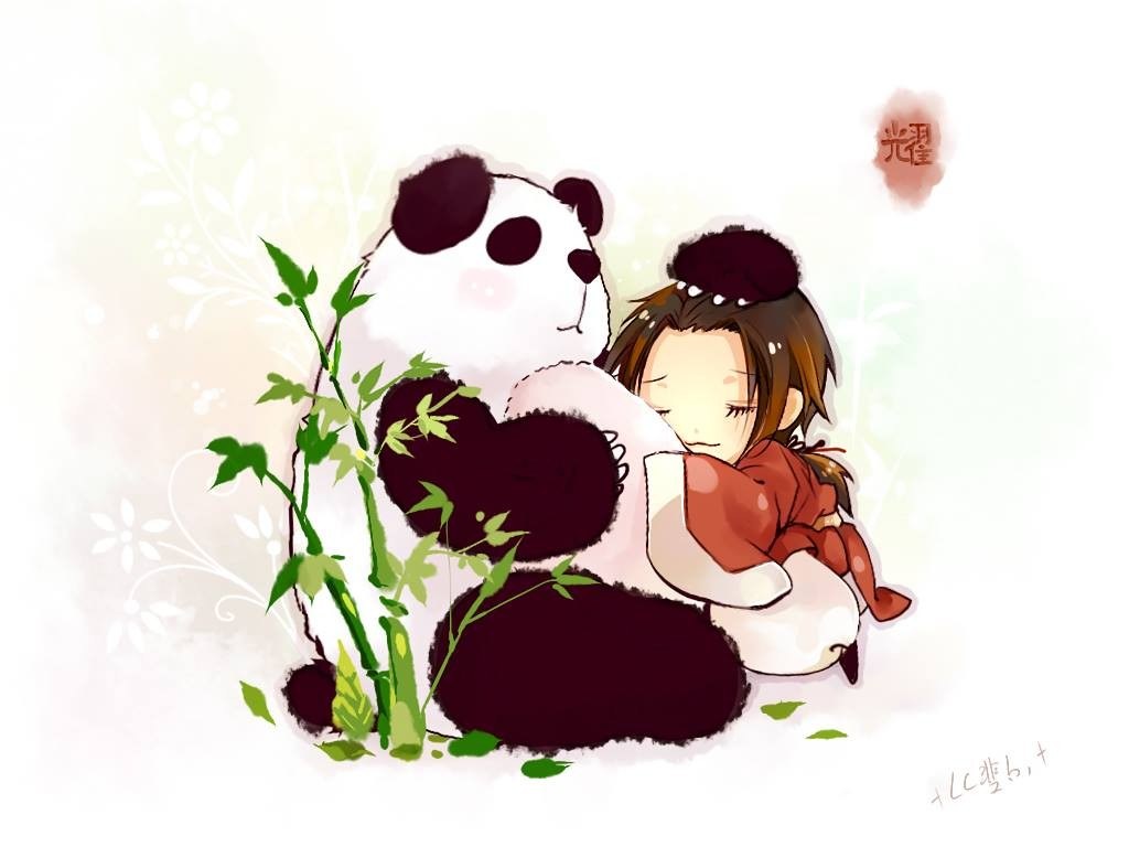 child hugging a panda