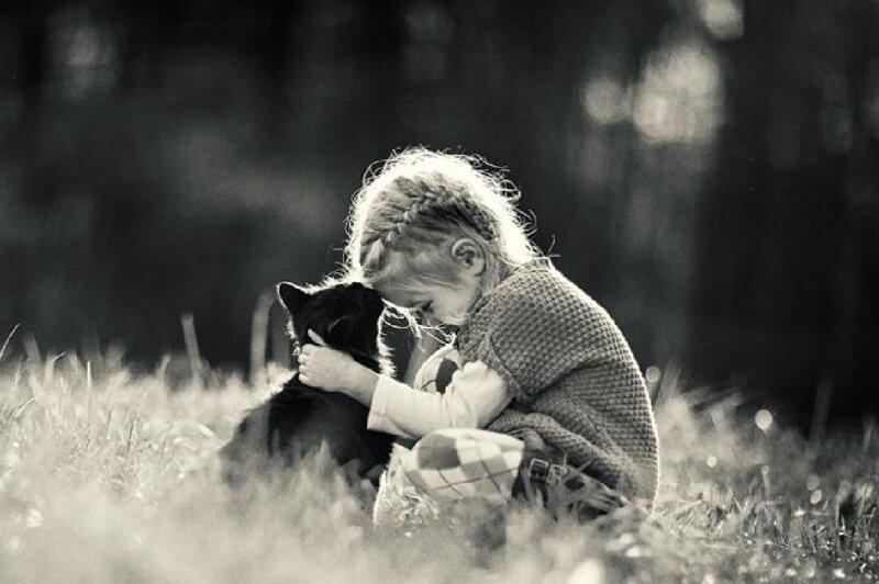 Child Hugging Dog — Black, Serene