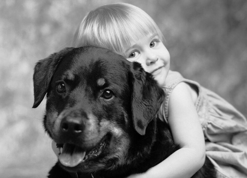 Child Hugging Dog — Black