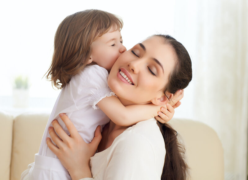 Child Hugging Mother