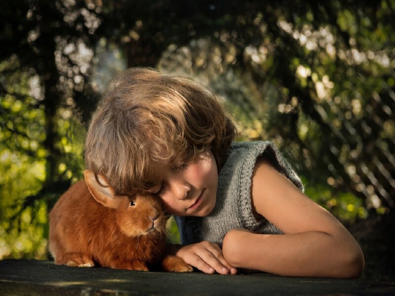 Child Hugging Rabbit