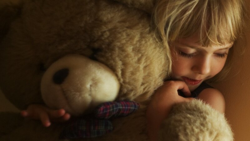 Child Hugging Teddy Bear — Brown, Calm