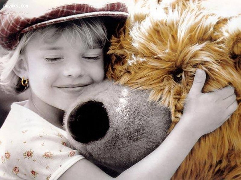 Child Hugging Teddy Bear — White