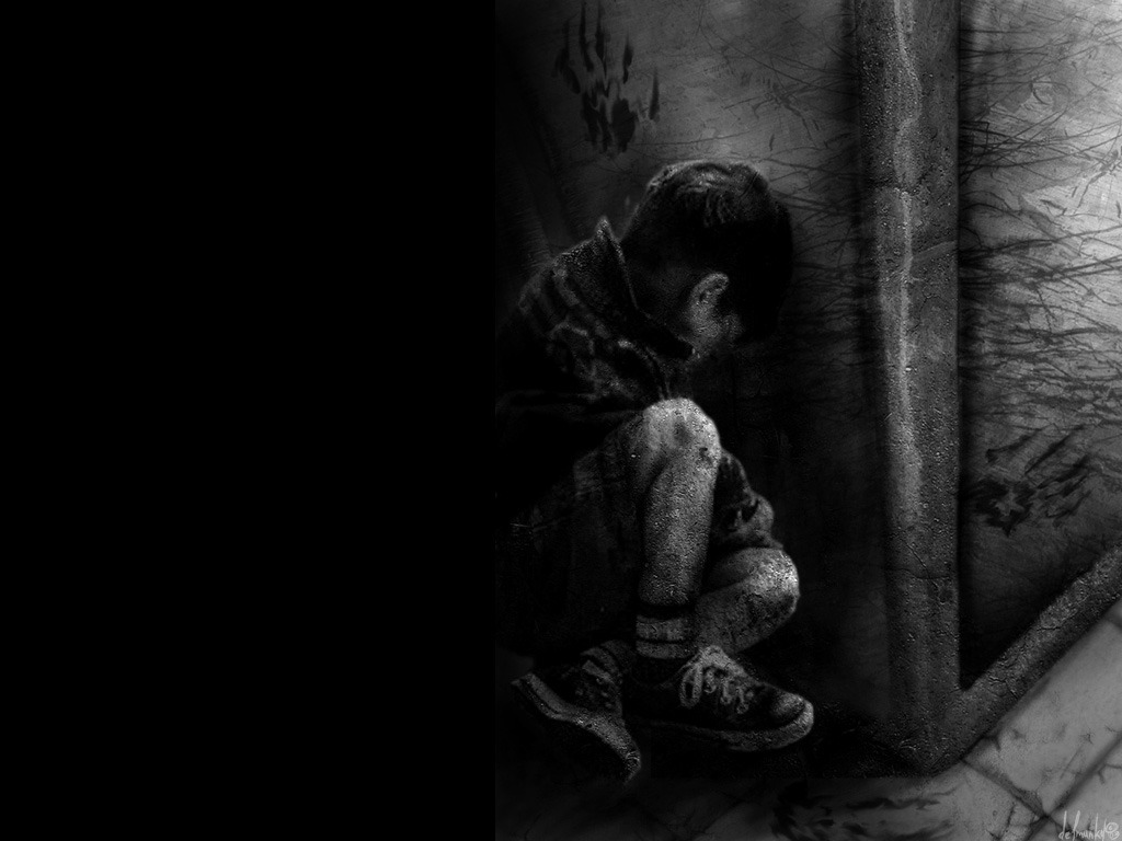 child in a dark corner