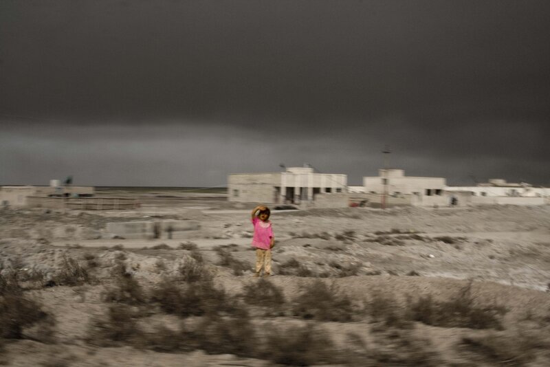 Child in a desert landscape