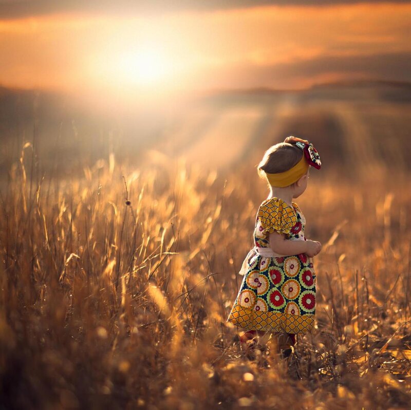 Child in a Field — Gold