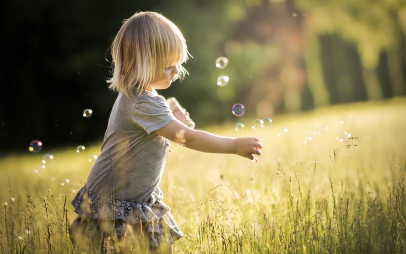 Child in a Field — Green, Serene