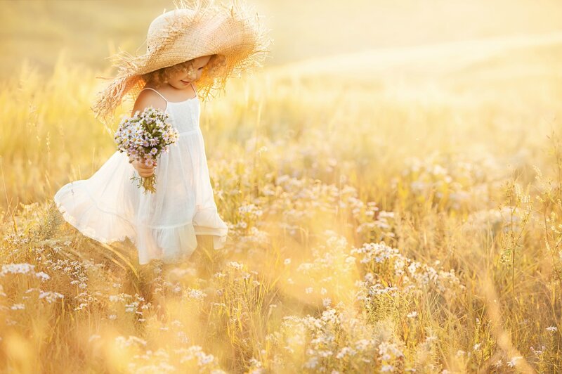 Child in a Field — Yellow