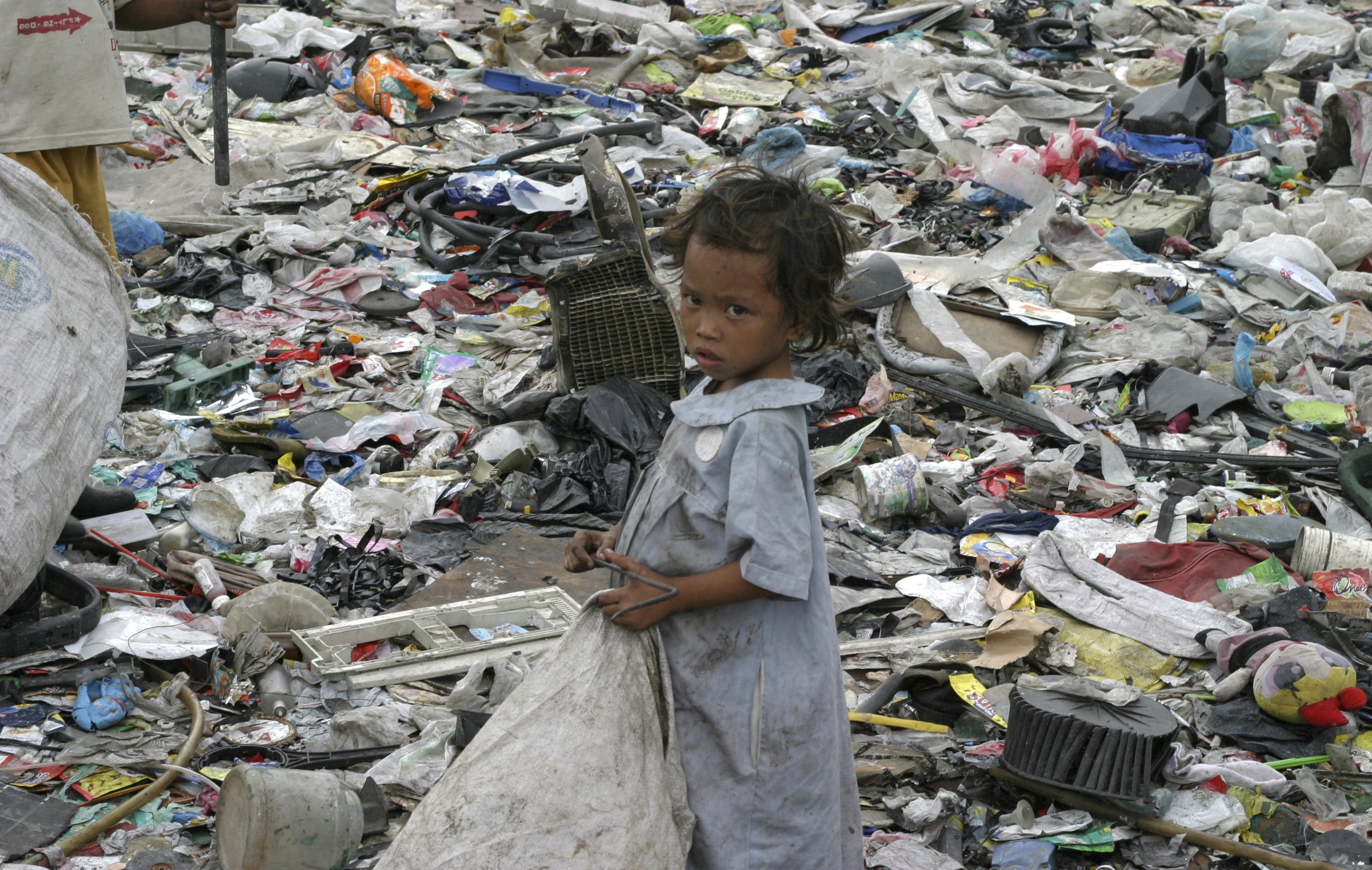 Child in a garbage dump
