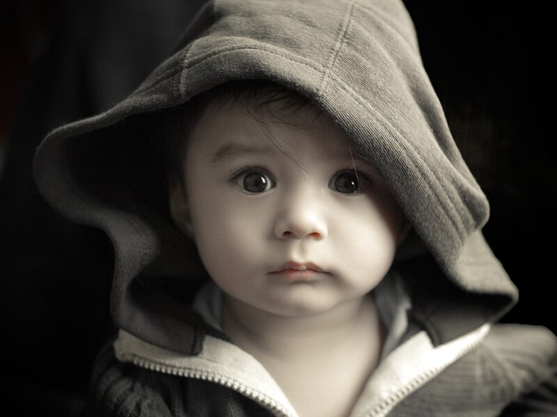 child in a hooded jacket