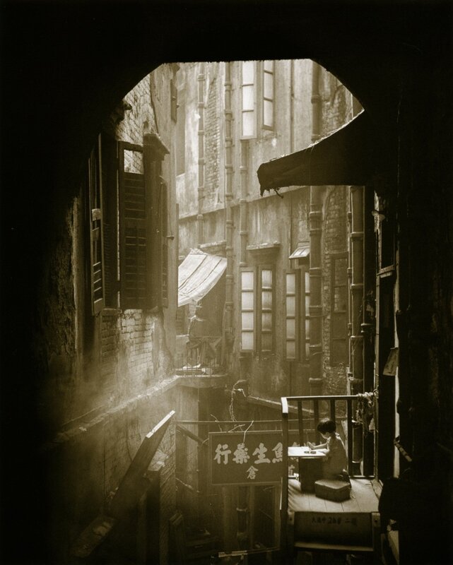 Child in a narrow alley