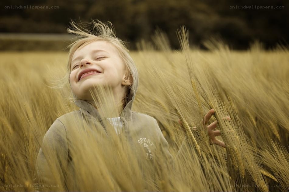 child in a wheat field
