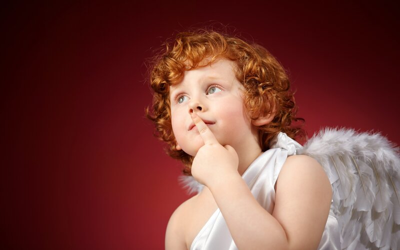 Child in Angel Costume — Red, Thoughtful