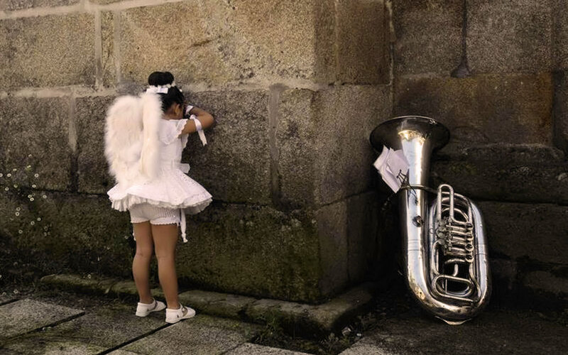 Child in Angel Costume — White, Somber