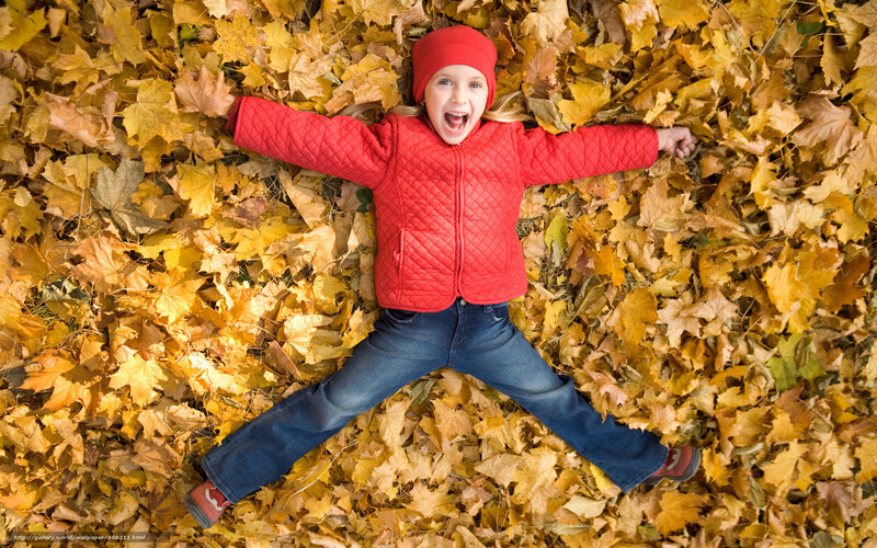 Child in Autumn Leaves — Yellow, Playful