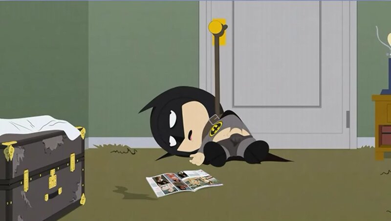 child in batman costume