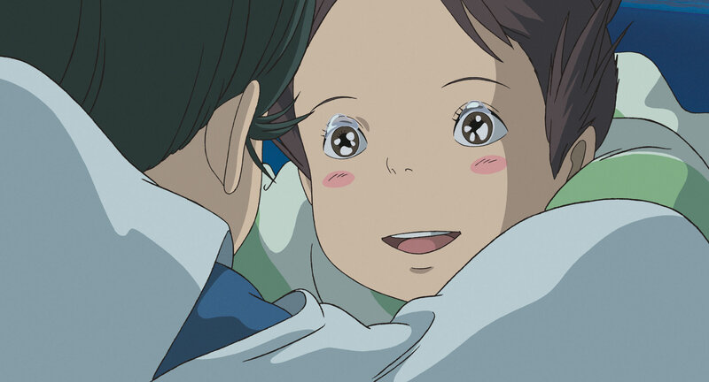 child in bed with adult